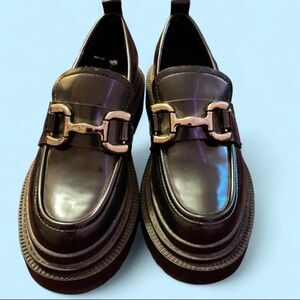 Woman's Black Loafers with Gold Buckle